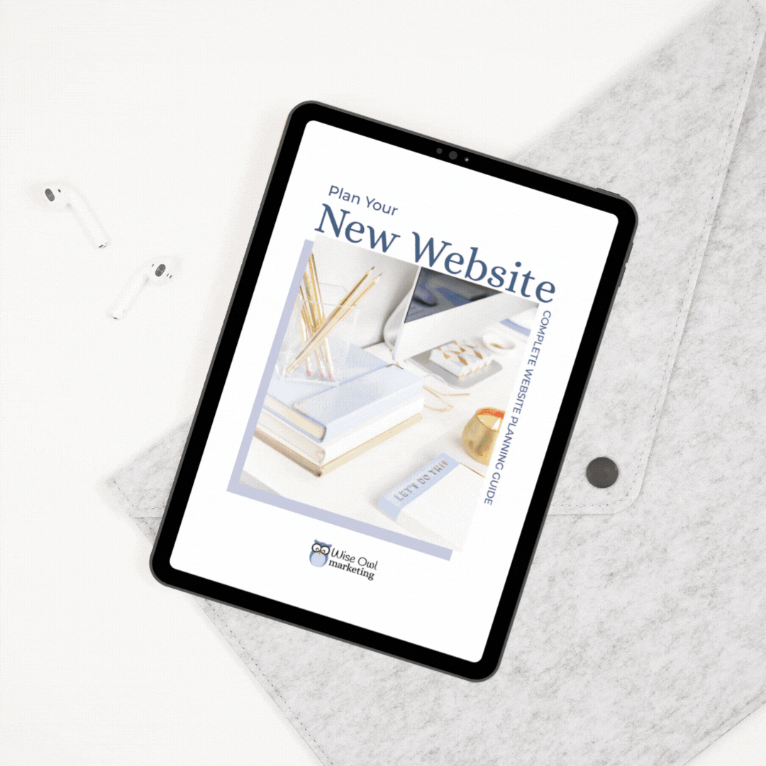 iPad laying on a gray case with the Complete Website Planning Guide pages flipping through